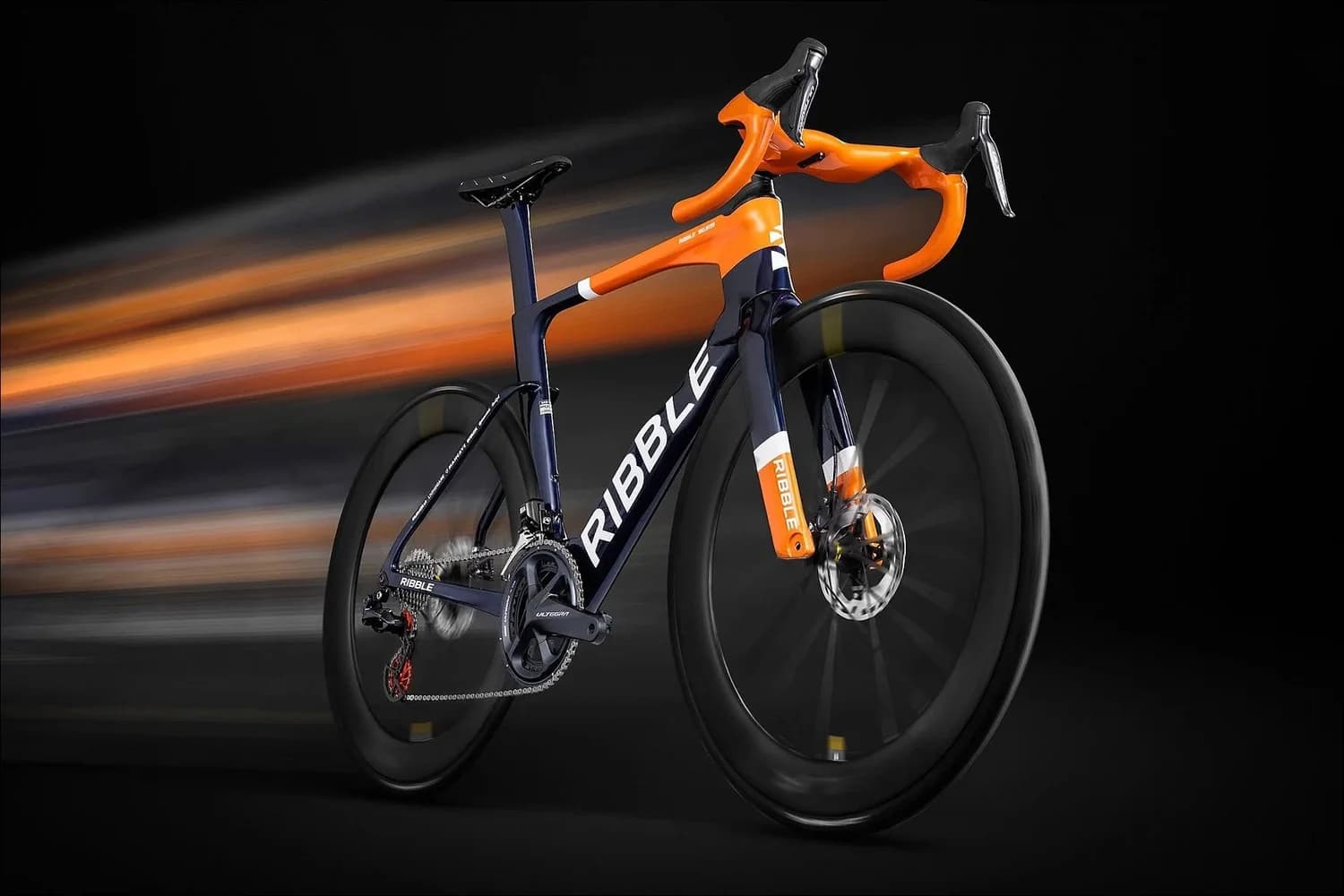 Dynamic speed-blur studio shot of a Ribble carbon road bike